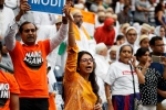 howdy modi photos, howdy modi photos, in pictures narendra modi indian americans at howdy modi, Indian flag