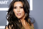 Kim Kardashian news, Kim Kardashian new bikini, kim kardashian sizzles in a wet swimsuit, Flat stomach