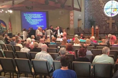 A candle light vigil is hosted by Fountain Hills Residents, In response to Virginia Violence