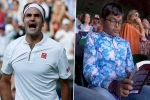 Indian origin boy reading book in Wimbledon 2019 Clash of Tennis, Wimbledon 2019 Clash of Tennis, roger federer vs rafael nadal semi final indian origin boy seen engrossed in his book during wimbledon 2019 clash of tennis, Rafael nadal