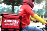 Zomato latest, Zomato share value, zomato has half its net loss, Zomato