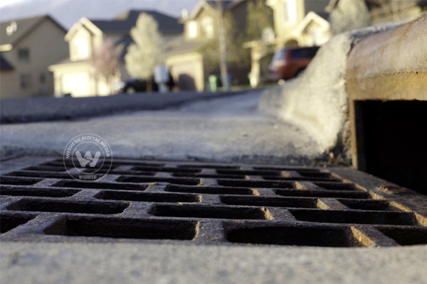 How did the man get stuck in a storm drain?},{How did the man get stuck in a storm drain?